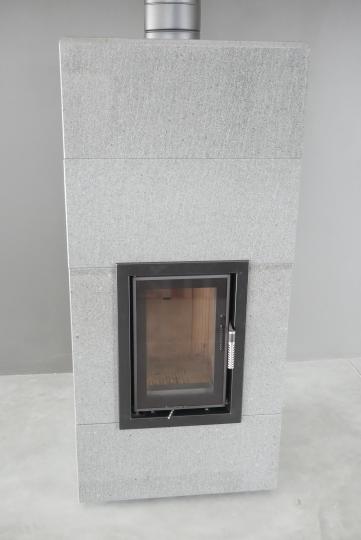 Wood stove Hector Air "S" in a volcanic stone building